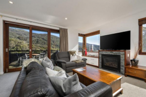 Elevation 2 bedroom with guest room gas fire and mountain views
